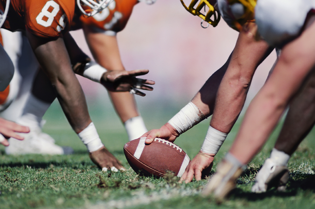 Por que a bola de futebol americano não é redonda?